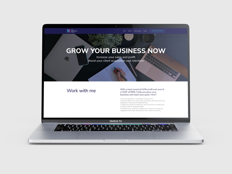 Laptop mockup featuring website for The Marketing Touch